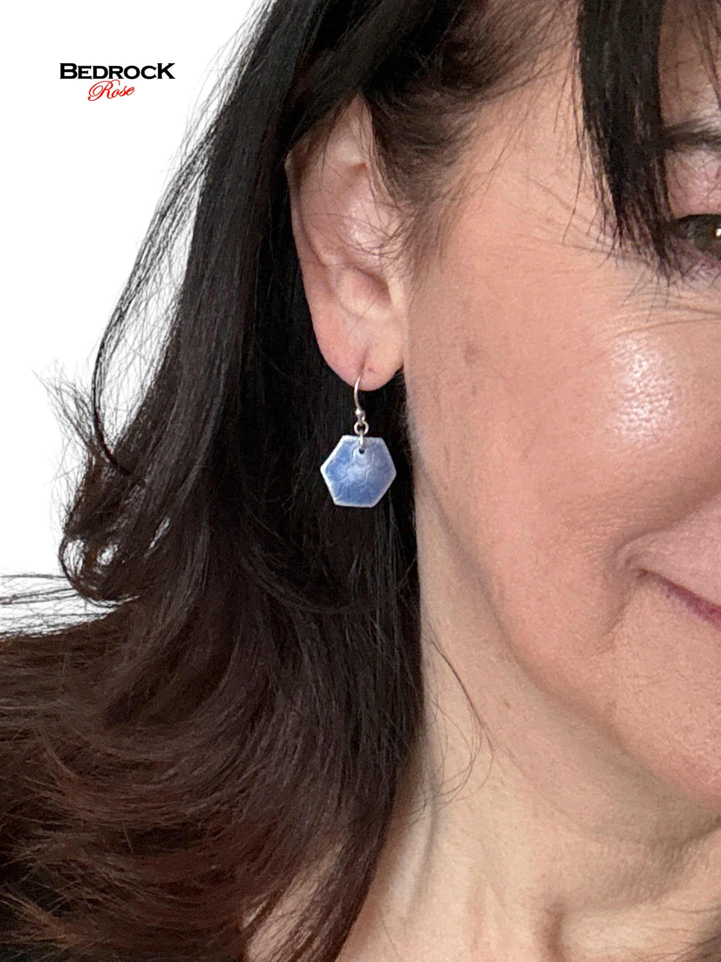 Periwinkle hexagon earrings, contemporary fashion earrings, stylish accessories, captivating color accents, trendy geometric designs, modern and chic fashion, handmade jewelry