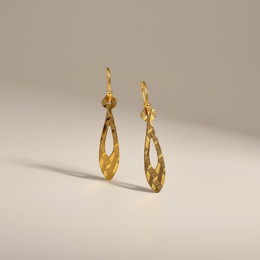 Bedrock Rose gold teardrop dangle earrings with geometric etched pattern. Modern, linear design.