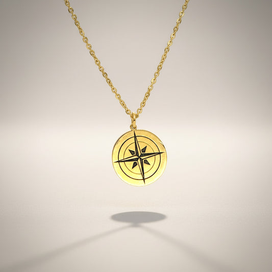 Bedrock Rose gold compass rose necklace on a faceted chain. Symbol of purpose and self-discovery.