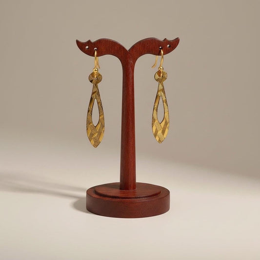 Bedrock Rose gold teardrop dangle earrings with geometric etched pattern. Modern, chic, and sophisticated.