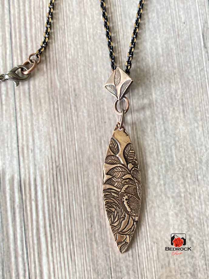 Warm Rose Bronze Rose Patterned Pointy Oval Necklace and Dangling Earrings, Glamorous Engraved Jewelry
