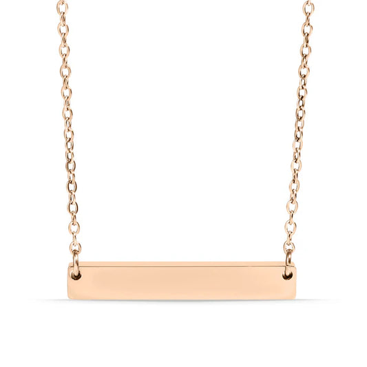 Rose gold bar necklace on a white background