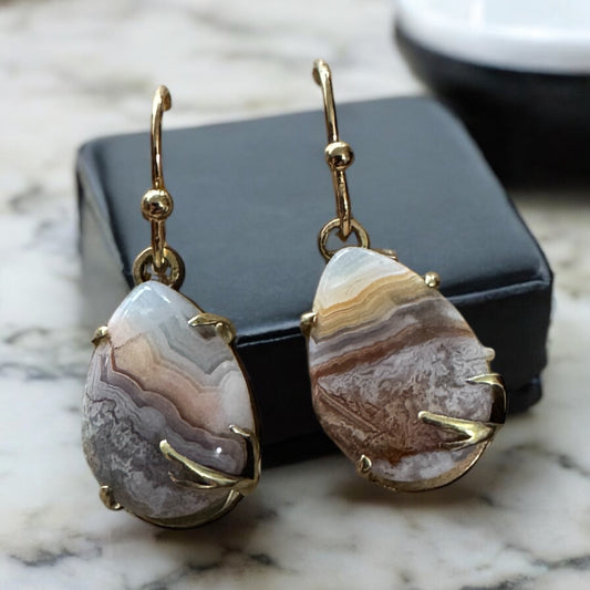 Pear-Shape, prong set crazy lace agate dangling earrings, high-polished brass
