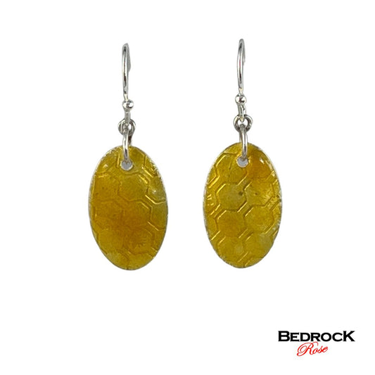 Honeycomb oval earrings, light amber jewelry, organic honeycomb design, warm amber hues, contemporary jewelry, lightweight accessories, handcrafted jewelry, modern jewelry