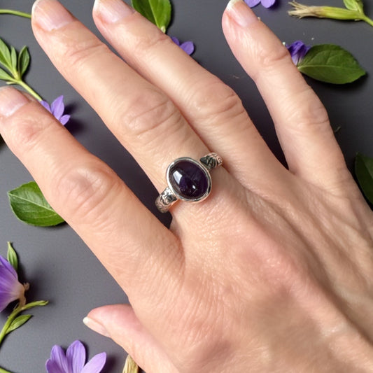 Amethyst cabochon ring with floral band