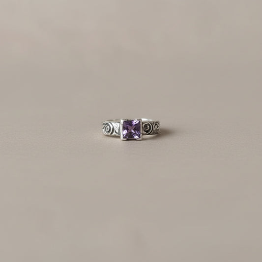 Bedrock Rose sterling silver ring with square amethyst-colored stone and floral engraving, size 8 3/4.