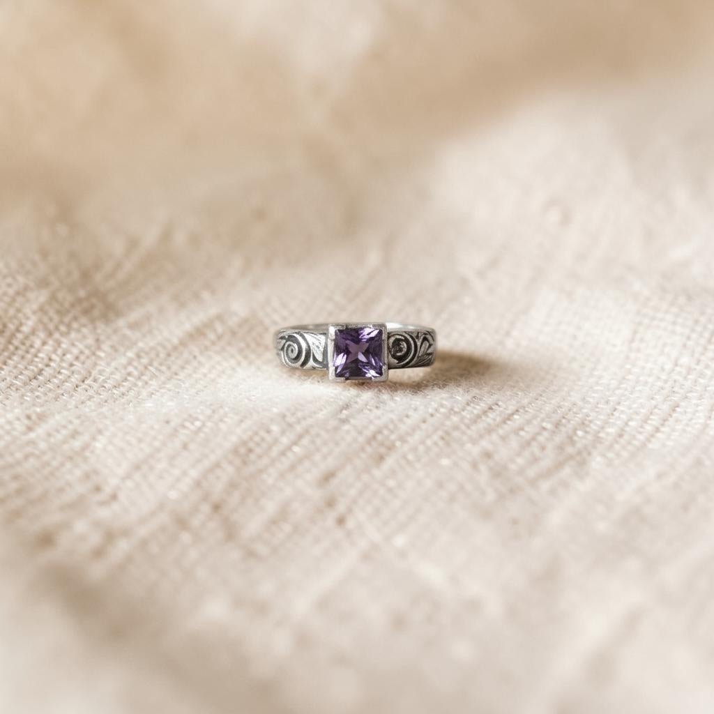 Bedrock Rose sterling silver ring with square amethyst-colored stone and floral engraving, size 8 3/4.