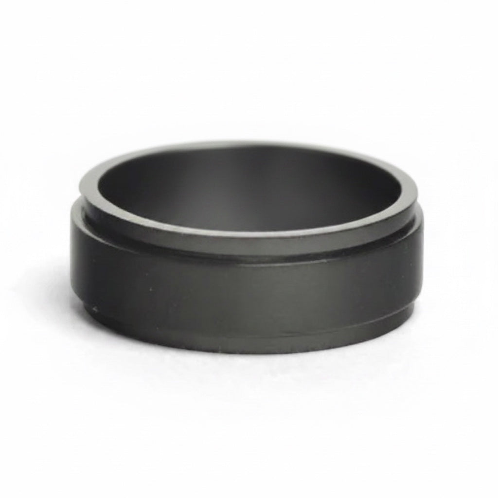 Bedrock Rose black stainless steel spinner ring with a matte finish, designed for anxiety relief and custom engraving.