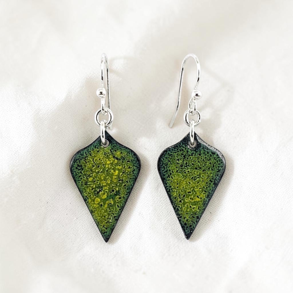 Bedrock Rose shield-shaped dangle earrings featuring a yellow and blue crackle enamel finish on hand-pressed copper.
