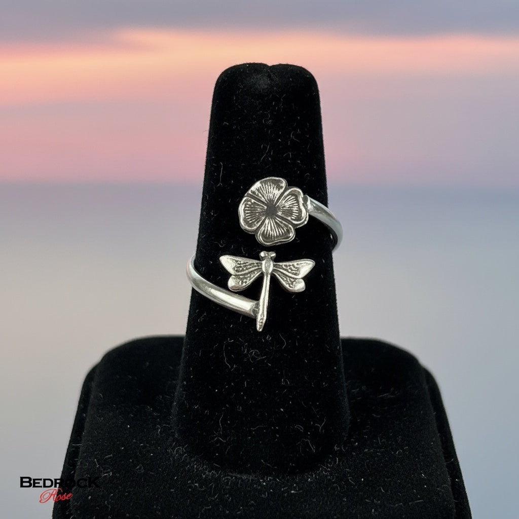 Bedrock Rose antique sterling silver wrap ring with dragonfly and blossom design. Adjustable botanical band.