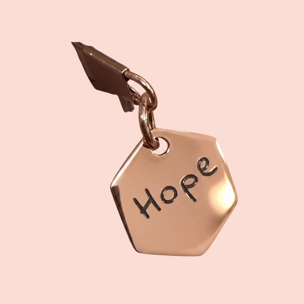 Bedrock Rose mini rose gold hexagon pendant with Hope engraved on polished hypoallergenic stainless steel