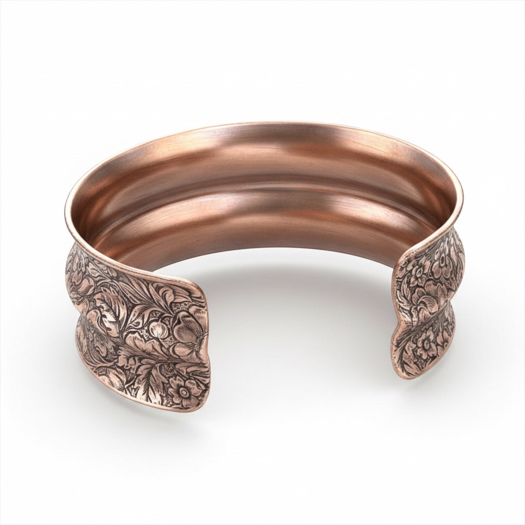 Bedrock Rose extra-large copper cuff bracelet with a double curve and detailed antiqued floral pattern.