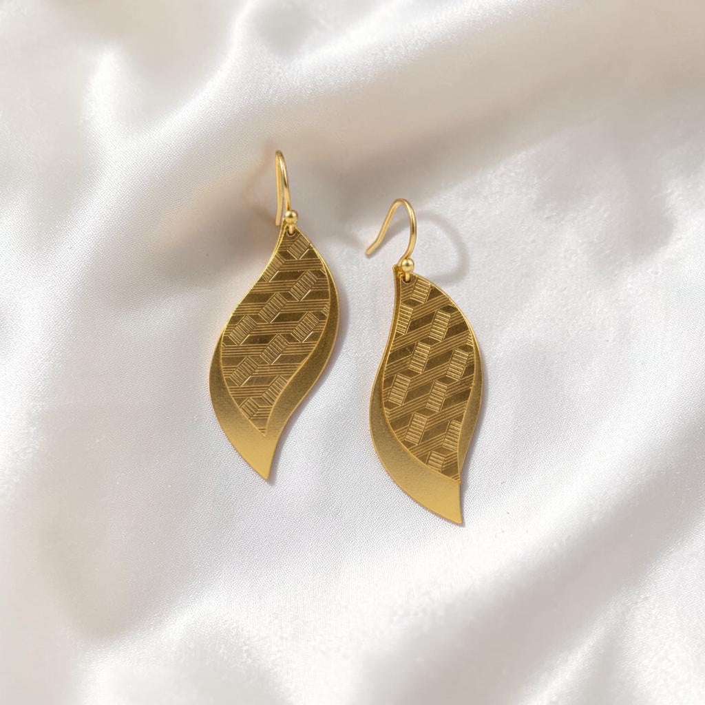 Bedrock Rose Art Deco geometric etched brass leaf dangle earrings with layered design and subtle movement.