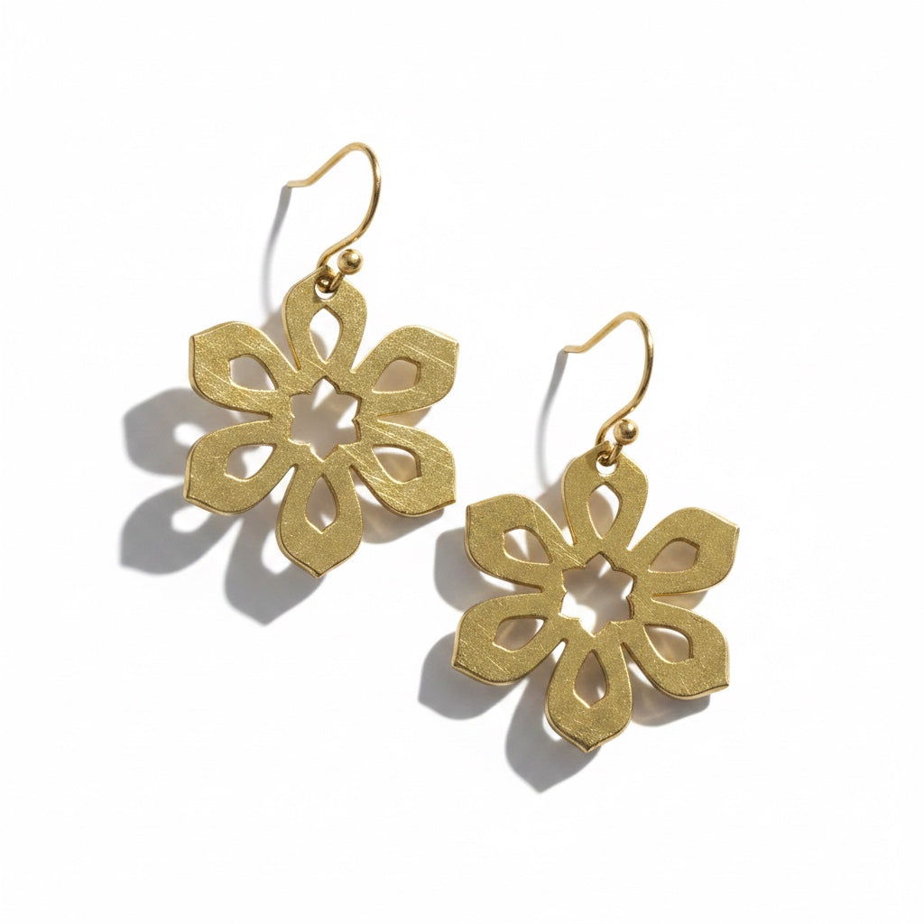 Bedrock Rose gold-plated brass Art Deco flower earrings with laser-cut floral design and surgical steel ear wires.
