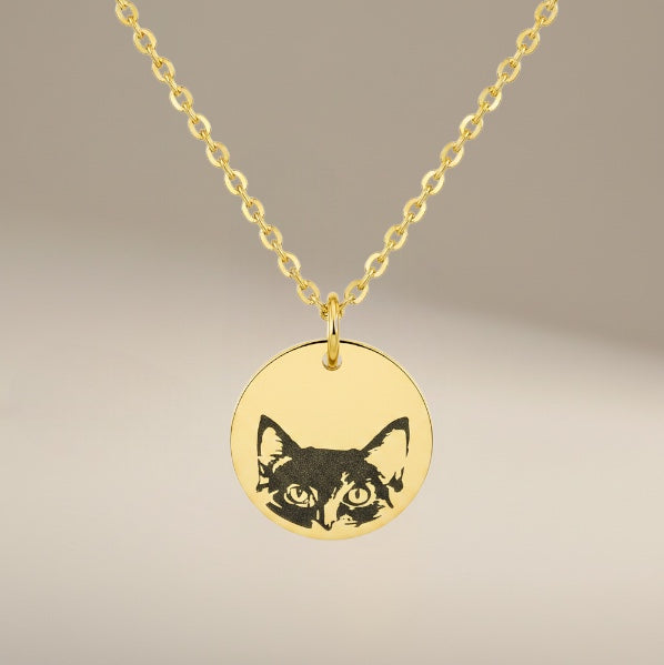 Bedrock Rose gold stainless steel necklace featuring a laser-engraved cat face on a round pendant with a cable chain.