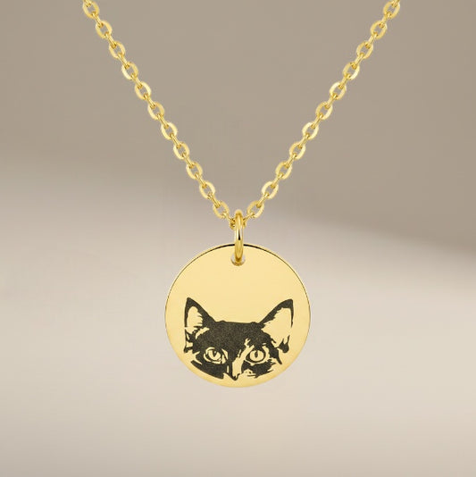 Bedrock Rose gold stainless steel necklace featuring a laser-engraved cat face on a round pendant with a cable chain.