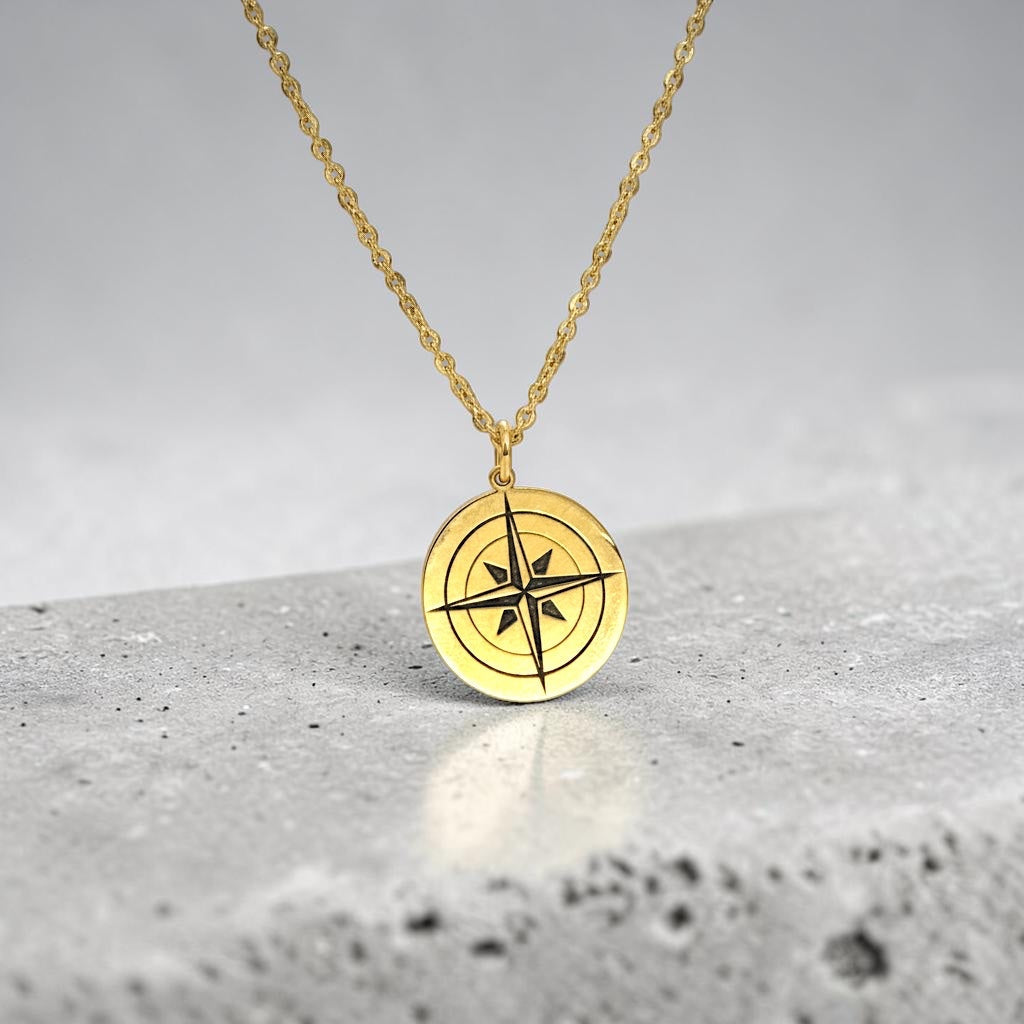 Bedrock Rose gold compass rose necklace with a faceted chain. Symbolizes purpose and self-discovery.