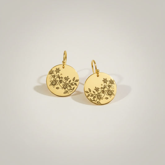 Bedrock Rose gold disc earrings with high-polish finish and engraved floral vine design.