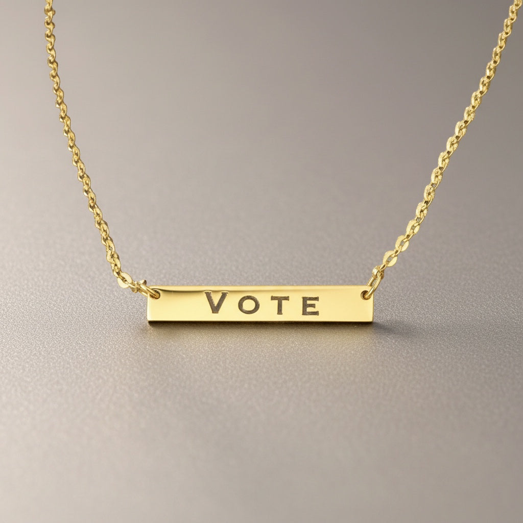 Bedrock Rose gold-plated stainless steel bar necklace with the word VOTE engraved. Hypoallergenic chain with extension.
