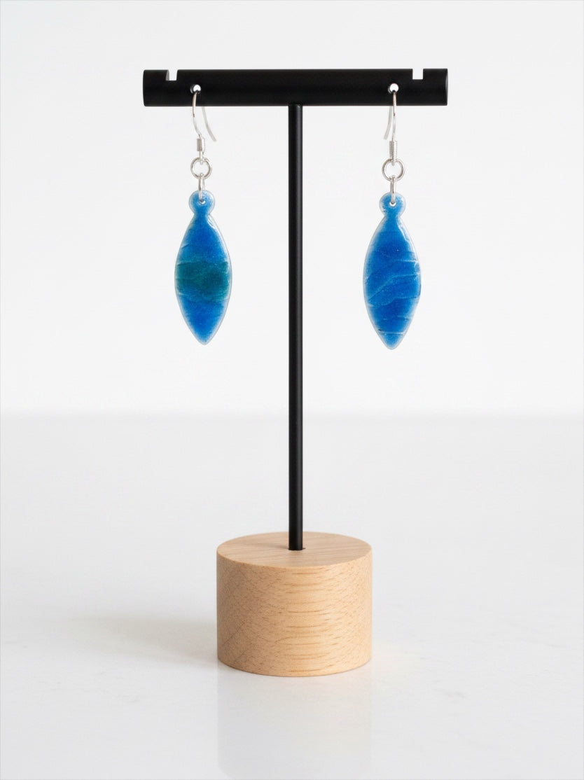 Bedrock Rose marquise-shaped earrings featuring a navy and lime green gradient enamel on textured fine silver.