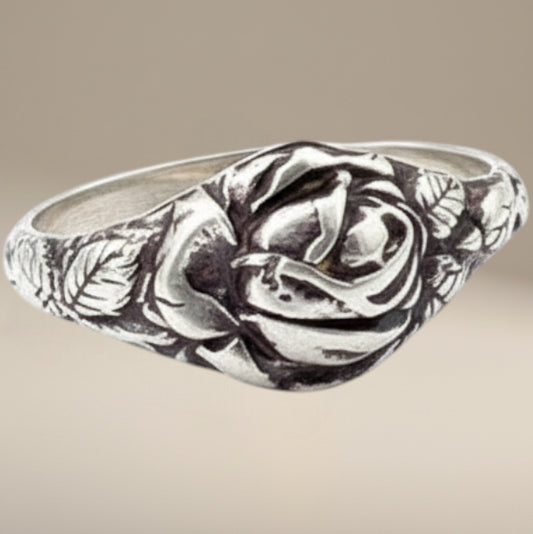 Bedrock Rose sterling silver ring with a detailed rose design and leaf accents. Size 9.