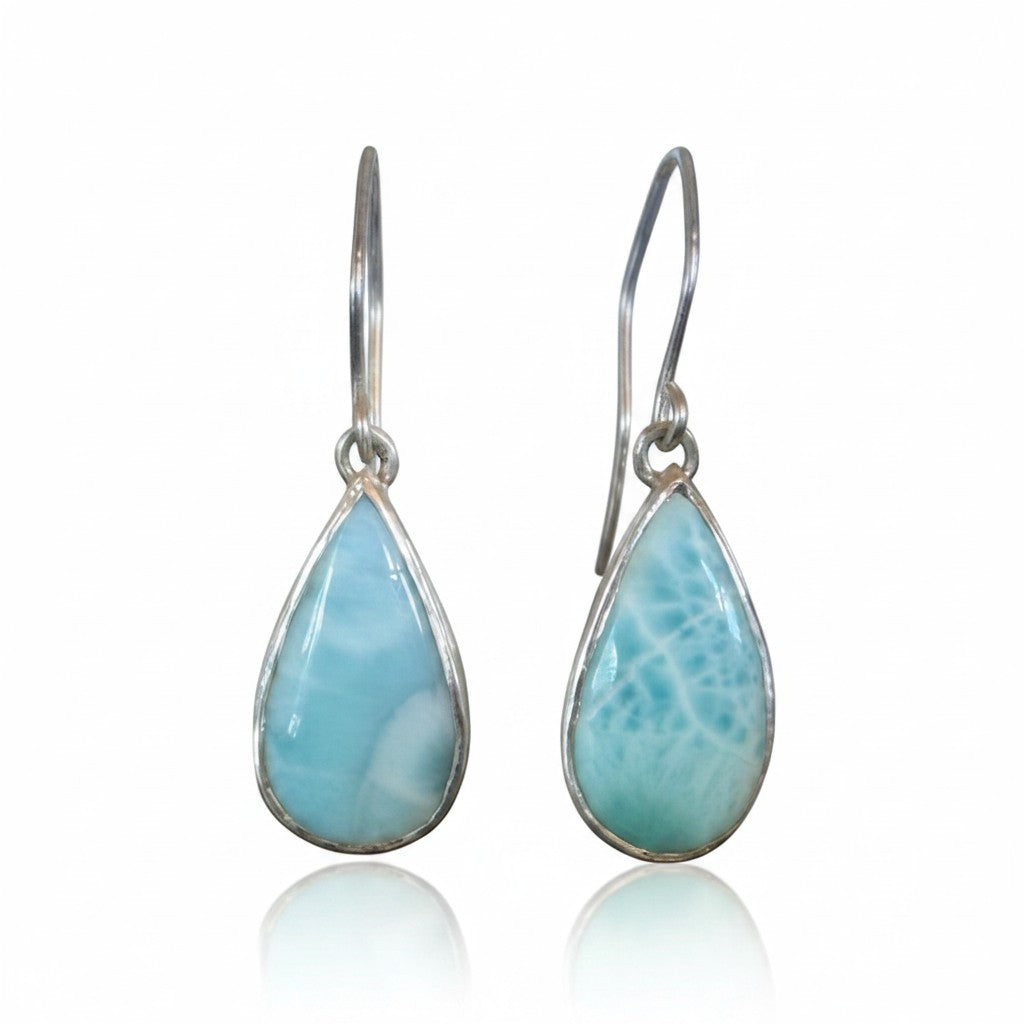 Bedrock Rose handcrafted sterling silver dangle earrings featuring natural blue Larimar teardrop cabochons.