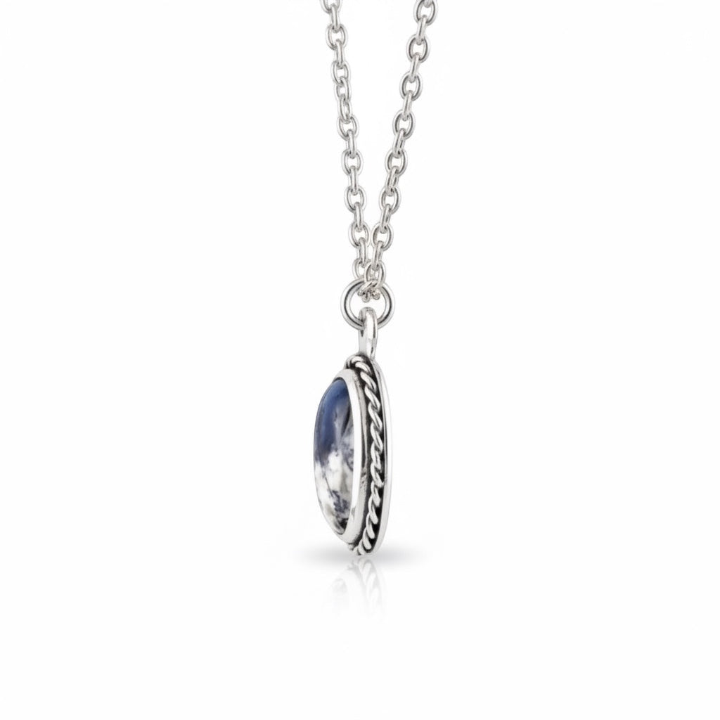 Bedrock Rose elegant Merlinite gemstone pendant with sterling silver twisted wire frame and scalloped edge.