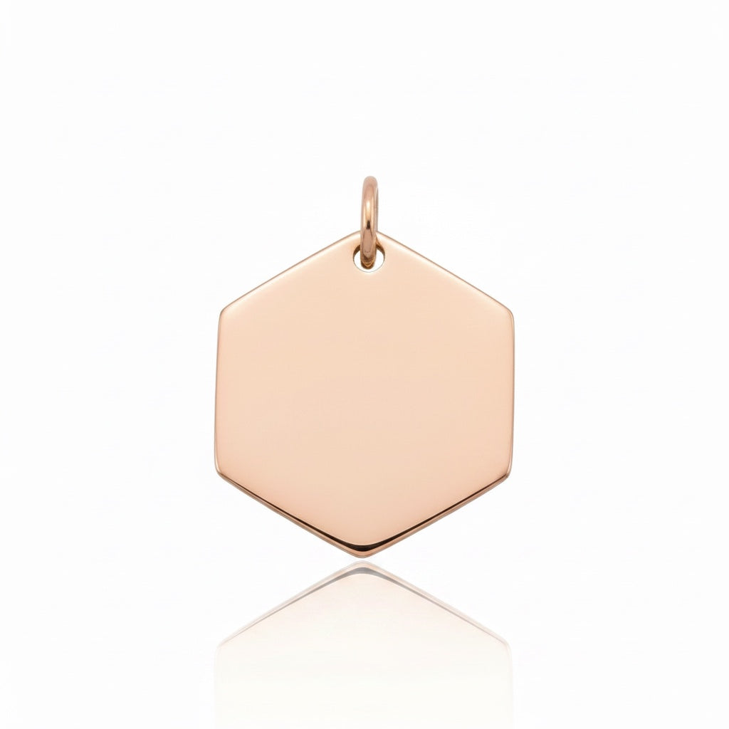Bedrock Rose mini hexagon pendant in polished rose gold stainless steel, perfect for custom engraving.