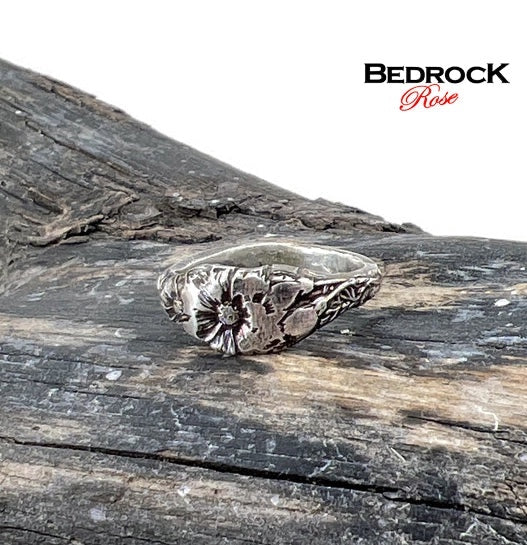 Bedrock Rose sterling silver ring featuring October cosmos birth flower design. Size 7.75.