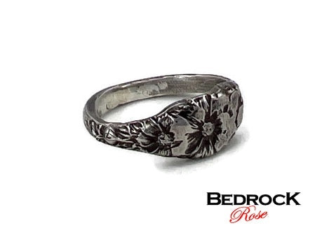 Bedrock Rose sterling silver ring featuring embossed October cosmos flowers, size 7.75.