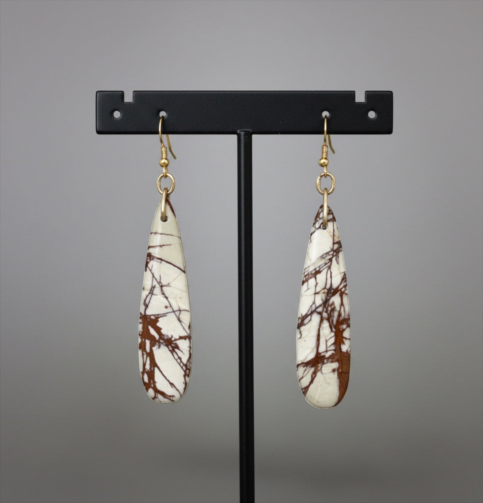 Bedrock Rose Picasso Jasper teardrop dangling earrings with brown and white natural stone patterns on gold-tone hooks.