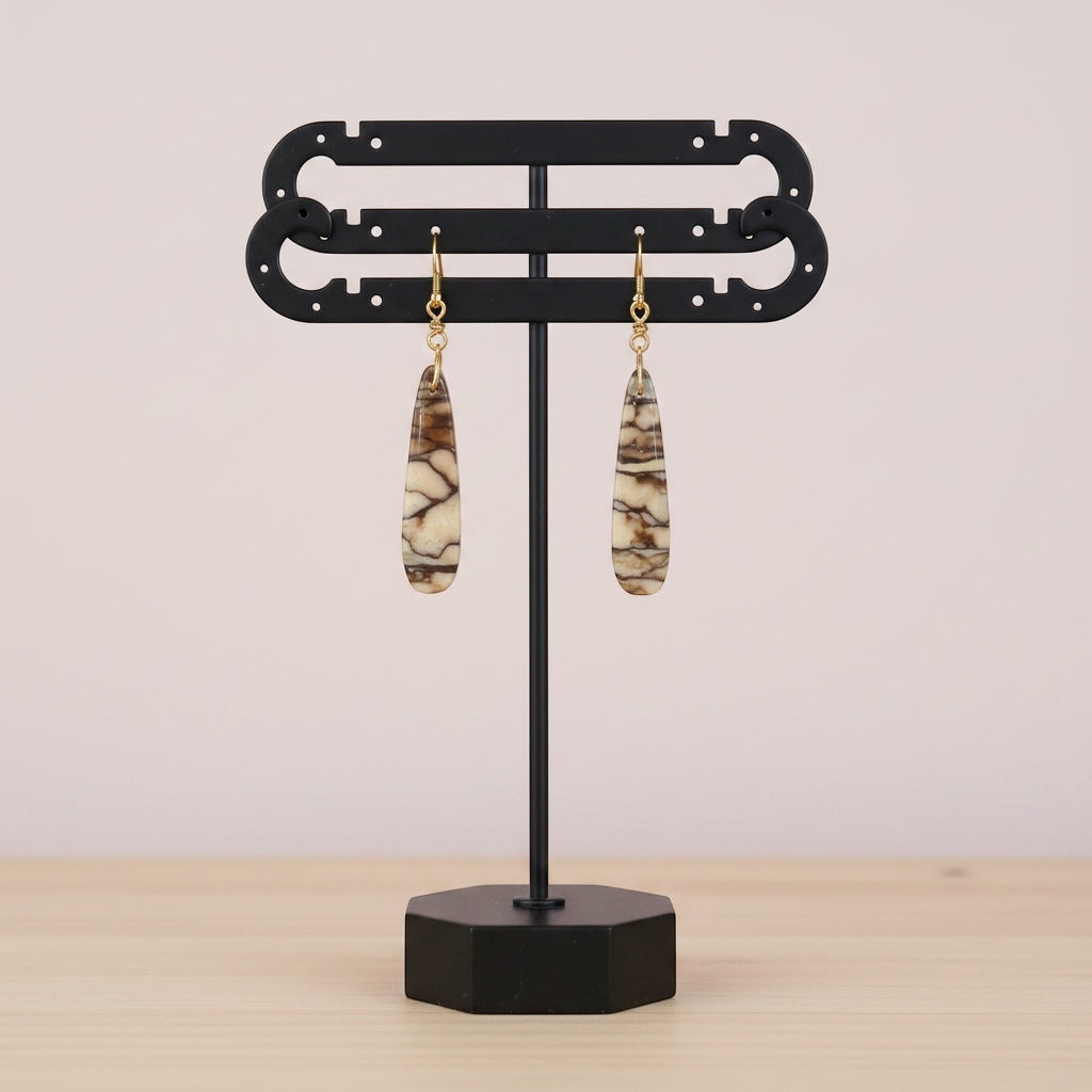Bedrock Rose Picasso teardrop stone dangle earrings with cream and brown marbled patterns and gold-plated findings.