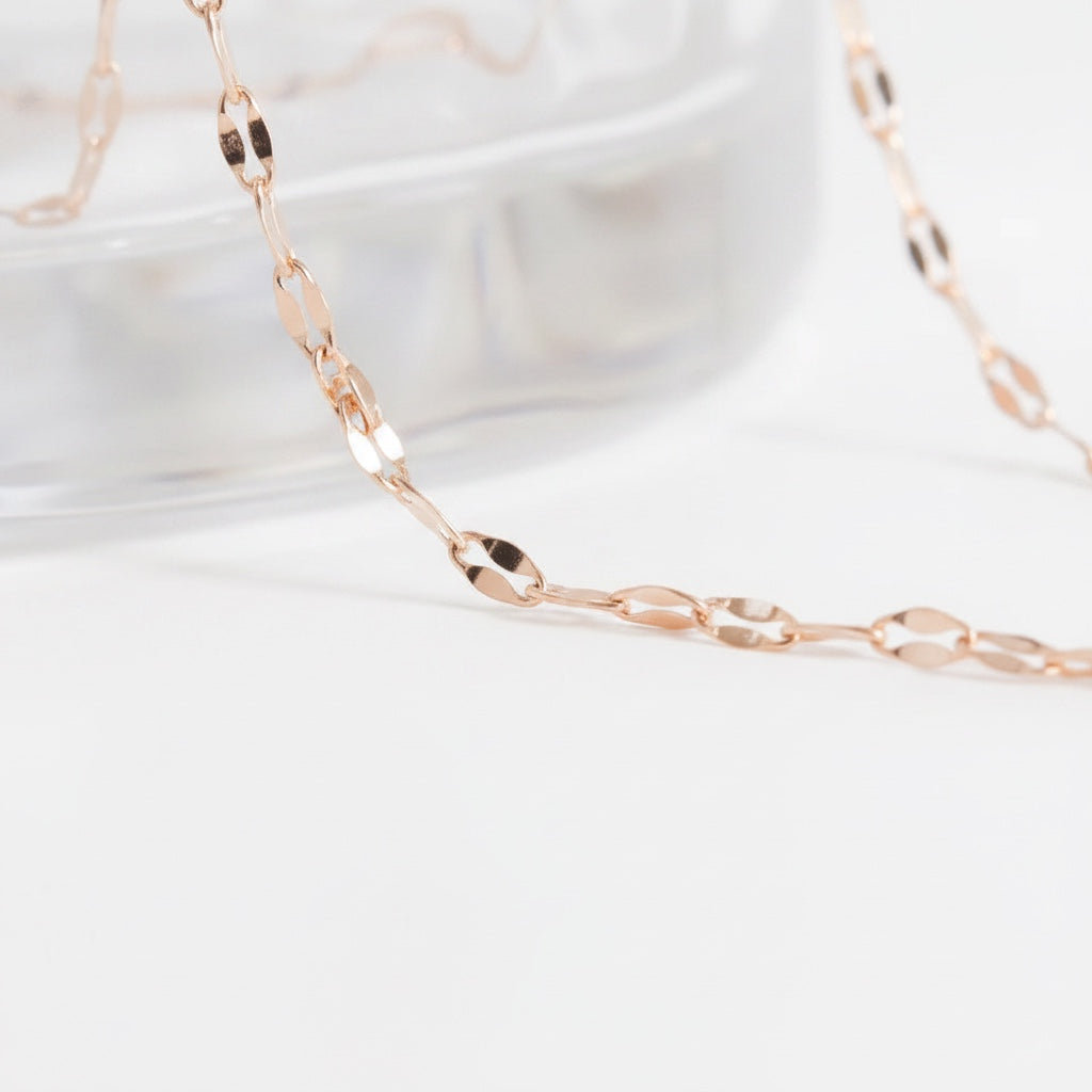 Bedrock Rose mini rose gold stainless steel lip chain necklace with delicate polished links on a white background