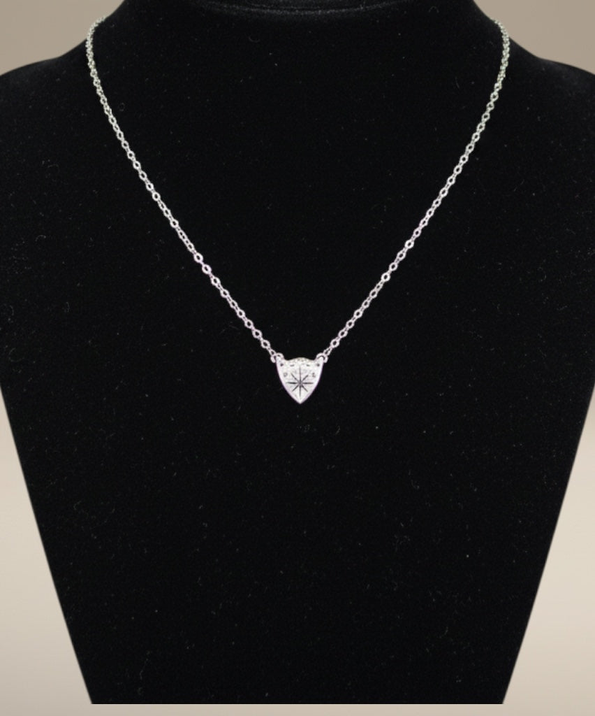 Bedrock Rose silver compass rose medallion pendant necklace on a dainty sterling silver cable chain