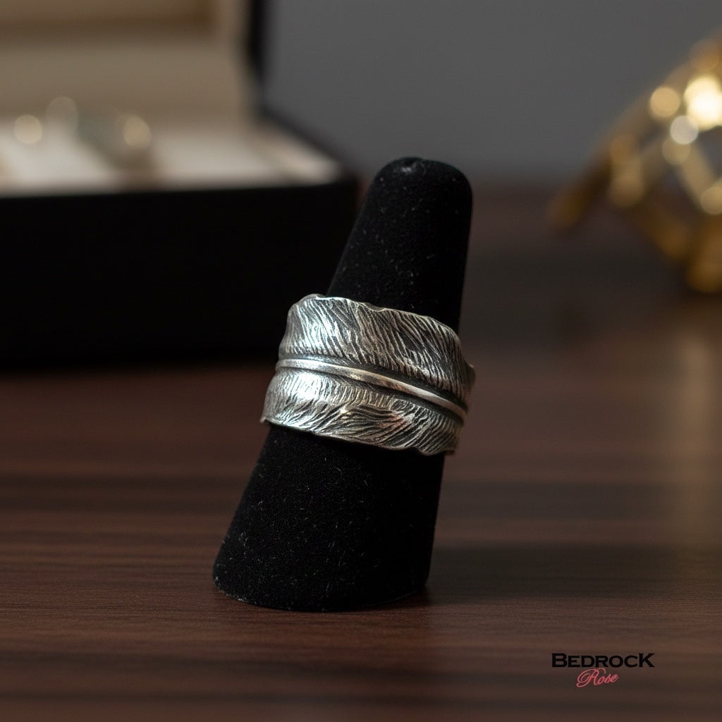 Bedrock Rose antique die-struck sterling silver feather wrap ring with oxidized patina. Size 8.