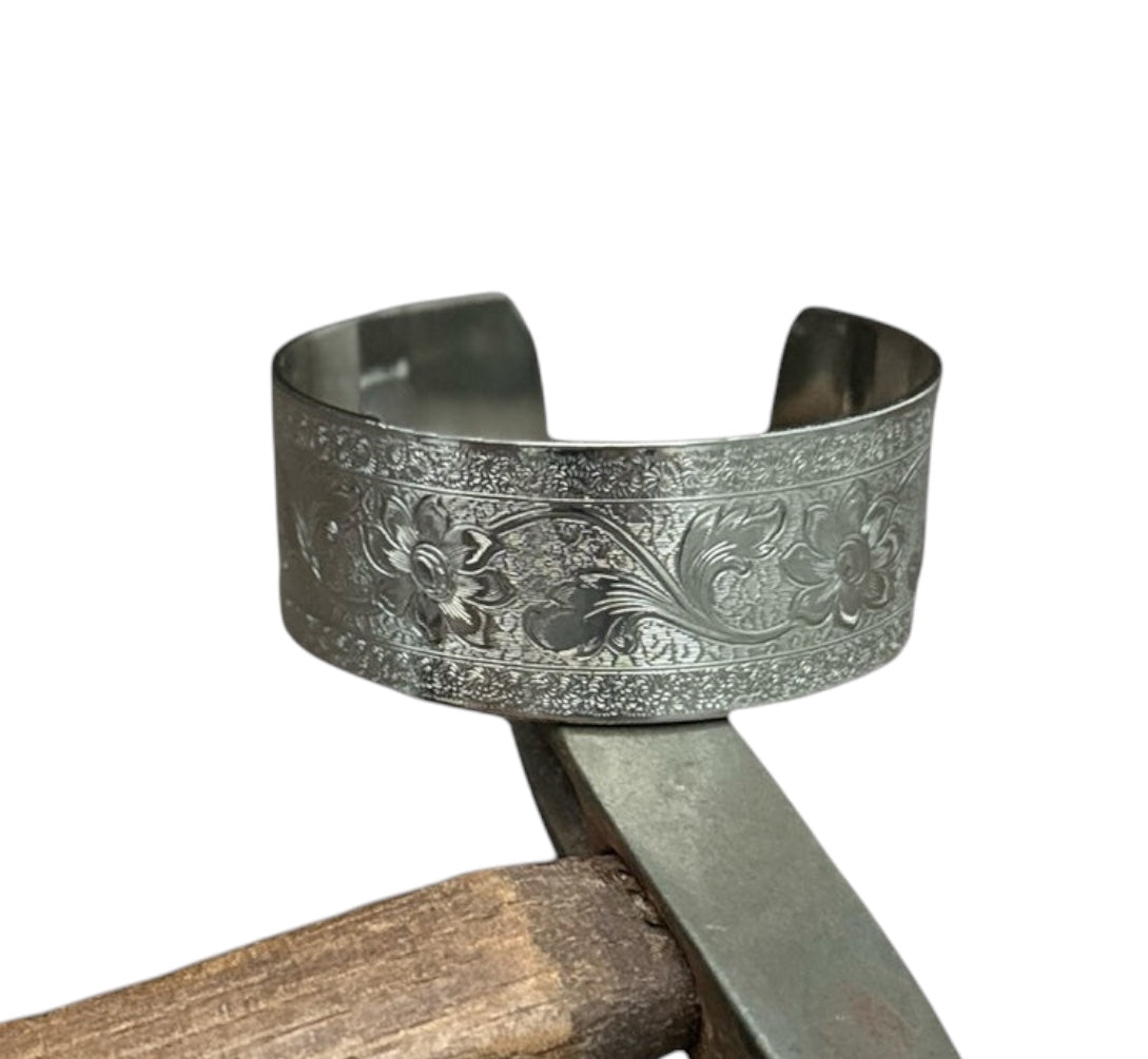 Bedrock Rose sterling silver-plated cuff bracelet featuring an intricate engraved floral flourish design