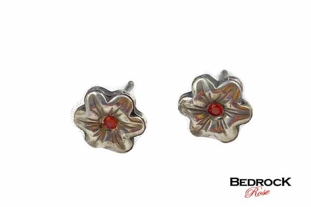 Bedrock Rose dainty silver flower post earrings with orange CZ center.