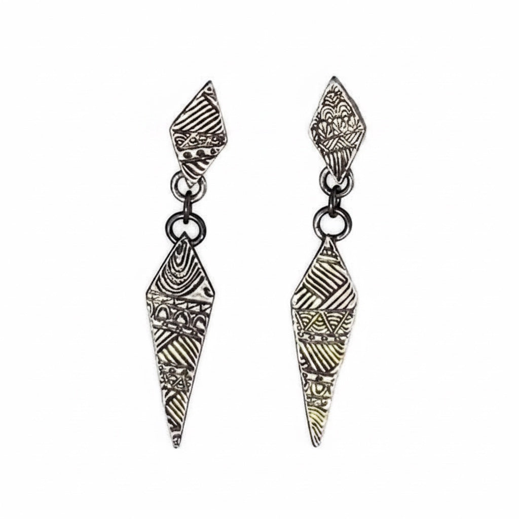 Bedrock Rose fine silver drop earrings featuring hand-stamped geometric quilt patterns in an elongated diamond shape.