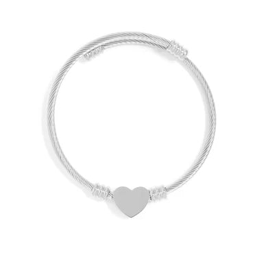 Bedrock Rose silver stainless steel adjustable cable cuff bracelet with a polished heart charm for engraving.
