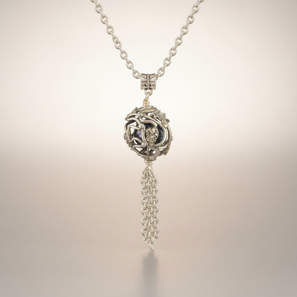 Bedrock Rose silver vine pendant necklace with grape clusters and tassel detail.
