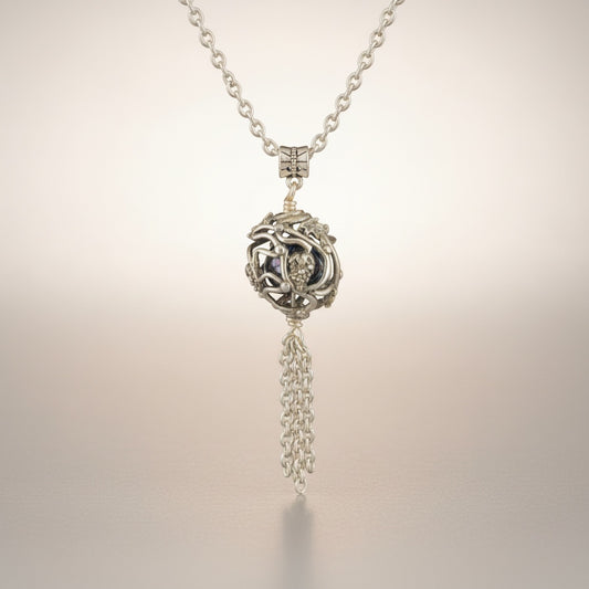 Bedrock Rose silver vine pendant necklace with grape clusters and tassel detail.