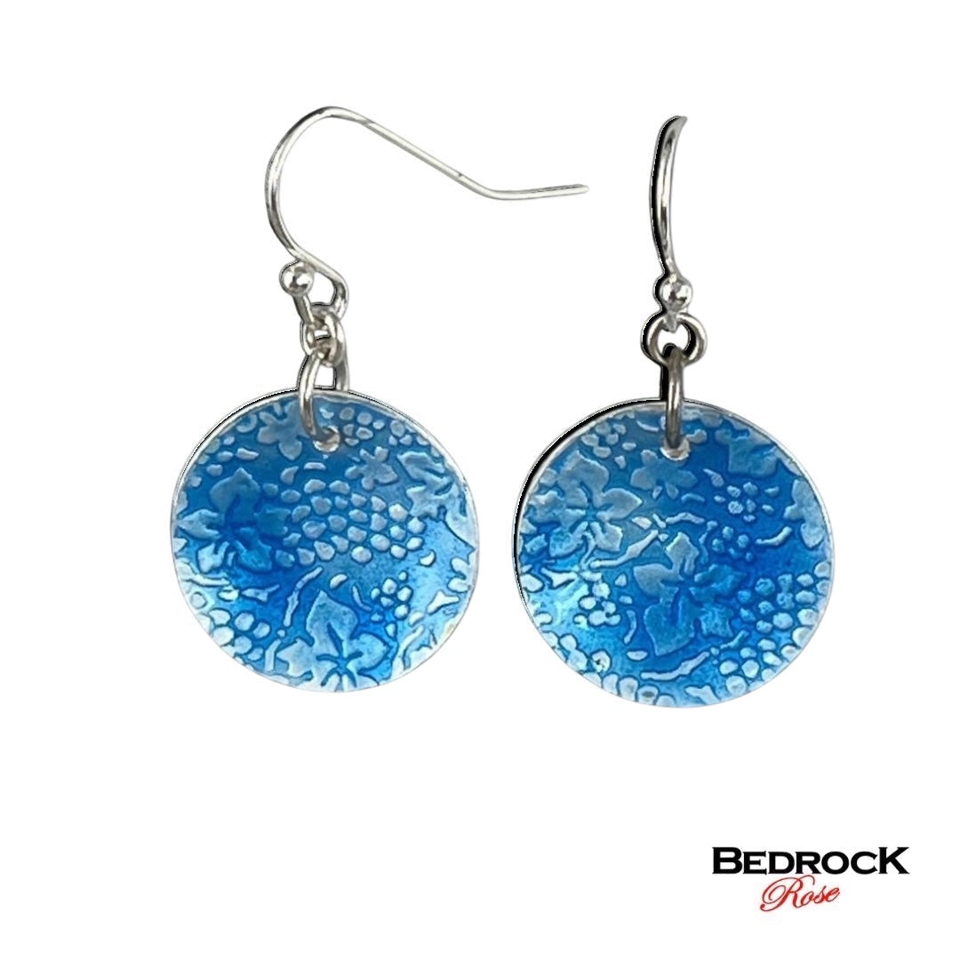 Bedrock Rose sky blue enamel on silver circle earrings with grape pattern.