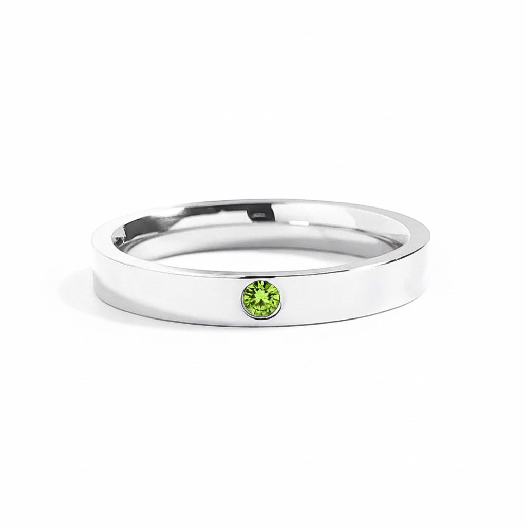 Bedrock Rose personalized stackable ring in stainless steel with a single green birthstone pave setting.