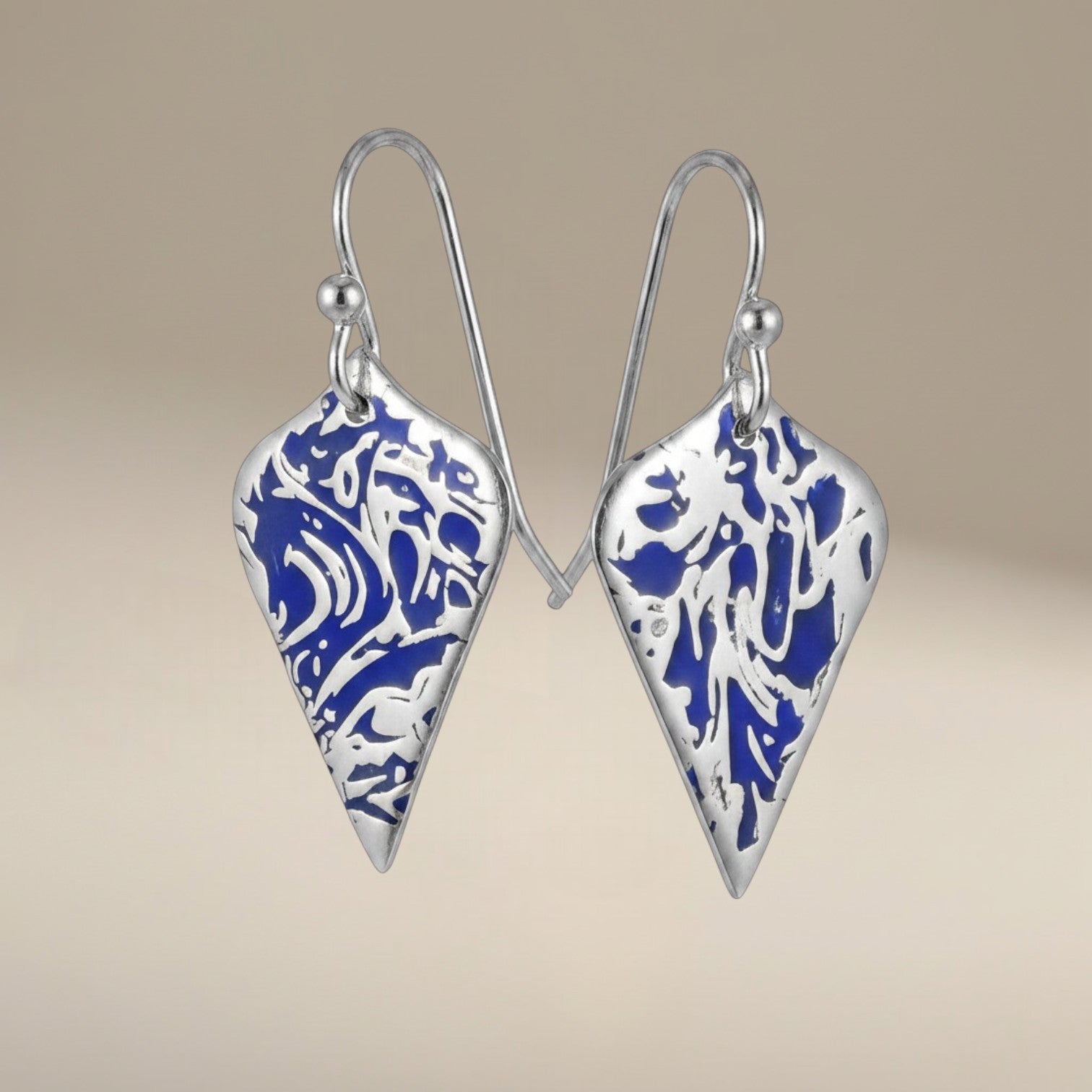 Bedrock Rose sterling silver shield dangle earrings with blue abstract branch texture and patina finish.