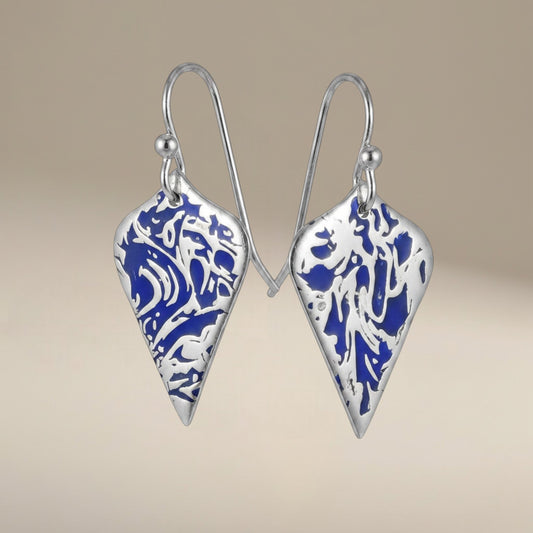Bedrock Rose sterling silver shield dangle earrings with blue abstract branch texture and patina finish.