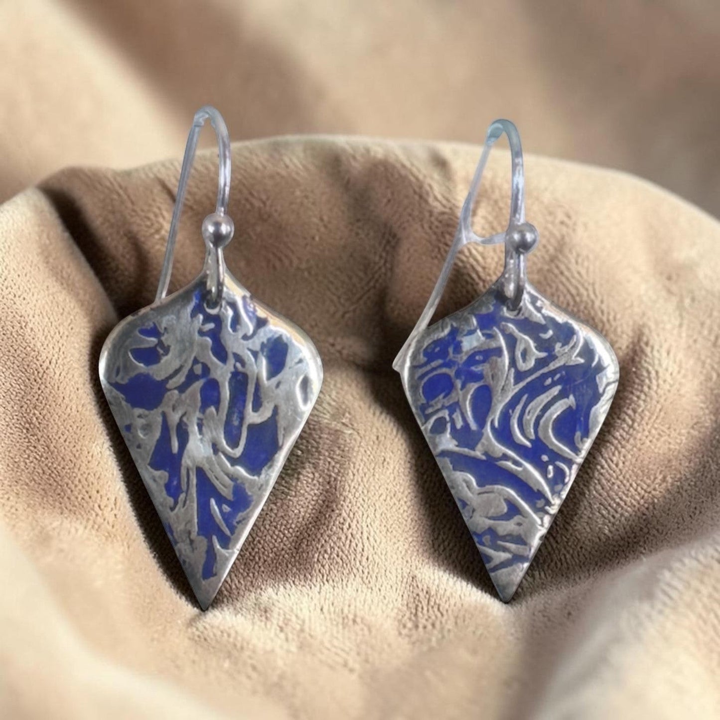 Bedrock Rose sterling silver dangle earrings with shield shape, blue abstract branch texture, and dark patina finish.
