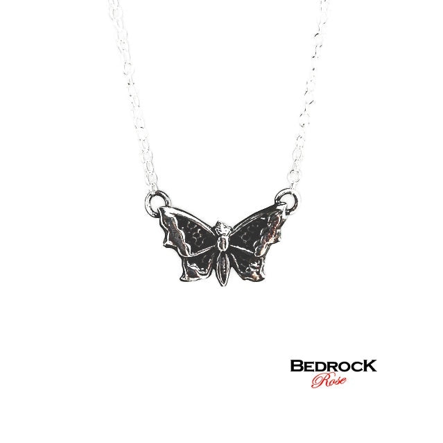 Bedrock Rose sterling silver butterfly pendant necklace with intricate wing detailing on a delicate chain