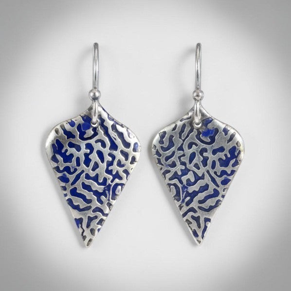 Bedrock Rose sterling silver shield dangle earrings with organic blue coral texture and dark patina finish.
