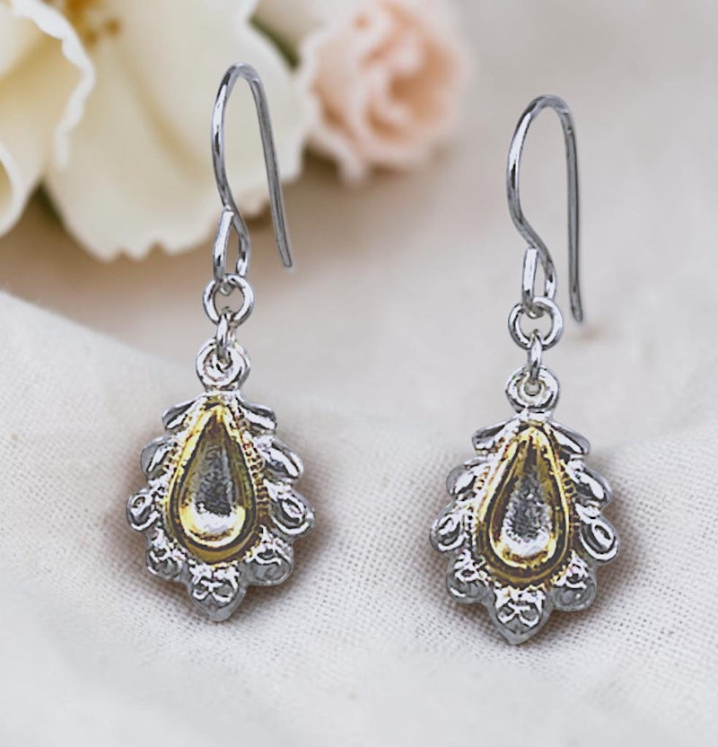 Bedrock Rose sterling silver teardrop dangle earrings with scalloped edges and 24k gold plated center accents.
