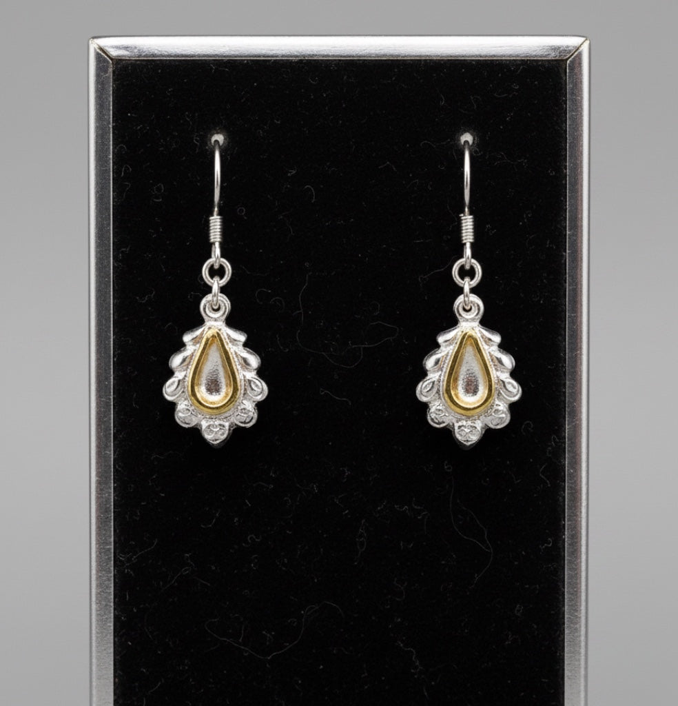 Bedrock Rose die-struck sterling silver teardrop earrings with scalloped edges and 24k gold plated center accents.